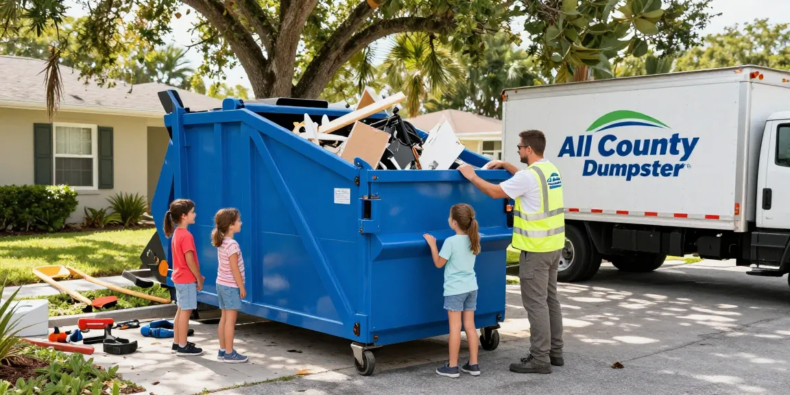 Efficient dumpster rental in Port Charlotte FL with family and team member loading debris into a blue roll-off dumpster.